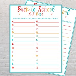 May include: Two white sheets of paper with a teal border. The top sheet has the text "Back to School A-Z Race" in colorful letters. The instructions read, "For each letter, write down something school related."