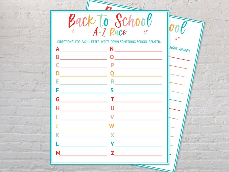 May include: Two white sheets of paper with a teal border. The top sheet has the text "Back to School A-Z Race" in colorful letters. The instructions read, "For each letter, write down something school related."