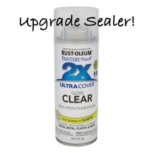 May include: A can of Rust-Oleum Painter's Touch 2X Ultra Cover Gloss Clear spray paint. It seals, protects, and revitalizes surfaces. It also bonds to plastic and is suitable for wood, metal, and more. The can is 12 oz (340 g).