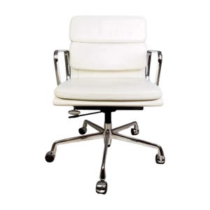 May include: White office chair with a high back and armrests. The chair has a padded seat and backrest, and a chrome-finished base with five wheels. The chair is designed for comfort and support.