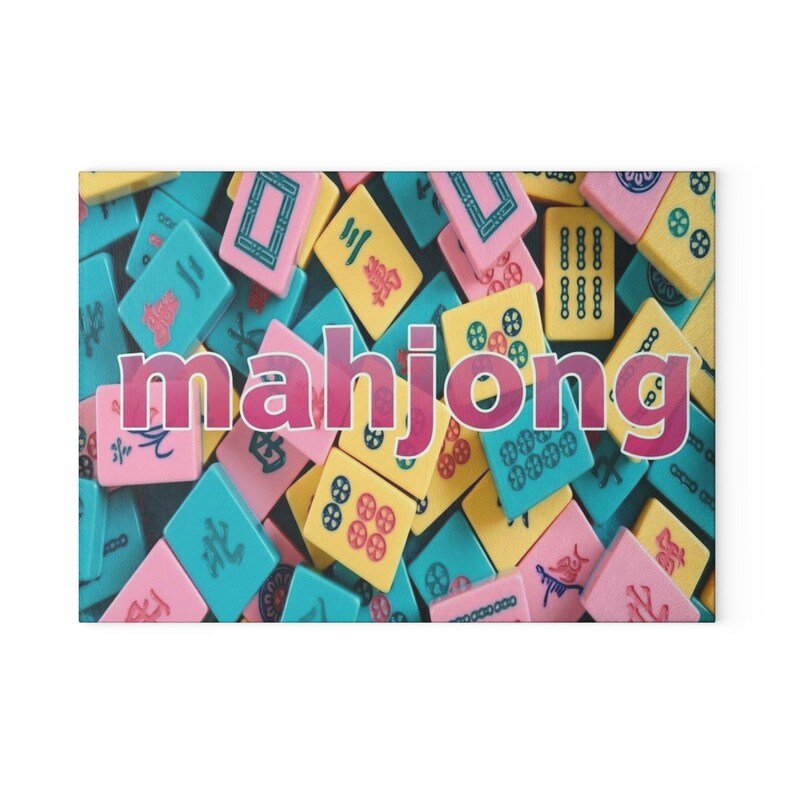 May include: A collection of rectangular mahjong tiles in shades of pink, yellow, and teal, each featuring unique black and red engraved symbols. The word mahjong is overlaid in large, bold, pink letters across the center of the tile arrangement.