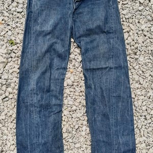 Vaqueros Levi's Engineered vintage de los años 2000, con pierna torcida y botones, talla 32x34