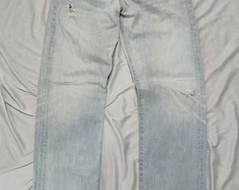 Vintage 00s Levi's 501 light blue stonewashed distressed look jeans W29