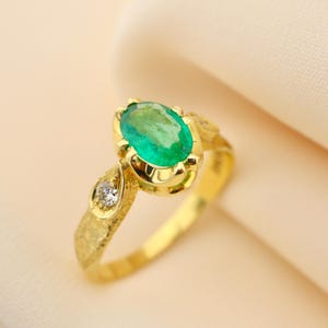 Unique Oval-Cut Emerald Ring with Diamonds in 14K Gold