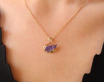 Regal Beauty: 14K Gold Swan Pendant Encrusted with Lavender Zirconia