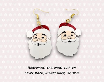 May include: A pair of white and red Santa Claus face earrings. The earrings are available in ear wire, clip on, lever back, kidney wire, or stud fittings.
