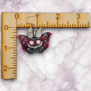 Mothman Earrings, cute cryptid art, mothman jewelry, cryptid jewelry, cryptid earrings, cute goth earrings, creepy jewelry, moth man art afbeelding 6