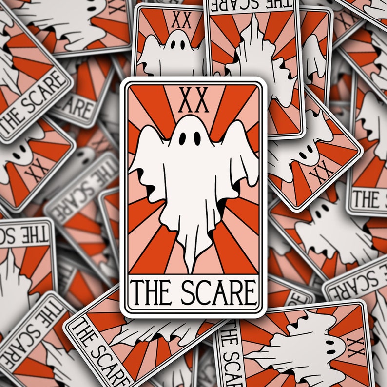 May include: A white ghost with two eyes and a mouth is flying in front of a red and pink sunburst. The card is white with a black border and the text "THE SCARE" in black letters.