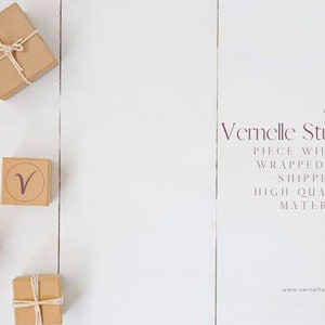 May include: Four small brown boxes with twine tied around them. Three of the boxes have a purple "V" logo on the front. The boxes are on a white wooden surface. The text "YOUR Vernelle Studio PIECE WILL BE WRAPPED AND SHIPPED IN HIGH QUALITY MATERIALS www.vernellestudio.com" is in the lower right corner of the image.