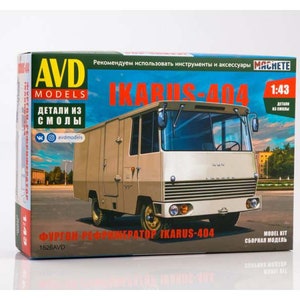May include: A model kit box for a 1:43 scale Ikarus-404 refrigerated van. The box features a colourful illustration of the van and the text "IKARUS-404" in large, bold letters. The box is labelled "AVD MODELS" and "ДЕТАЛИ ИЗ СМОЛЫ" (details from resin).