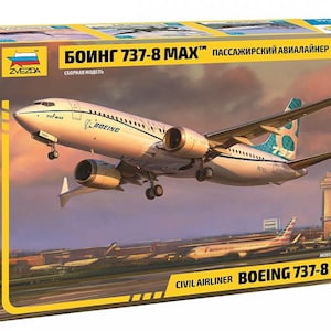 Puede incluir: Una caja de kit de modelo a escala 1/144 de Zvezda para un avión de pasajeros civil Boeing 737-8 MAX. La caja presenta una ilustración del avión blanco en vuelo, con el texto BOEING 737-8 MAX y la marca ZVEZDA en el empaque amarillo y azul.