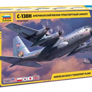 Pode incluir: Uma caixa de kit de modelo em escala 1/72 da Zvezda para um avião de transporte pesado americano C-130H. A caixa apresenta uma ilustração de uma aeronave militar cinza em voo contra um céu nublado, com o texto C-130H e American Heavy Transport Plane.