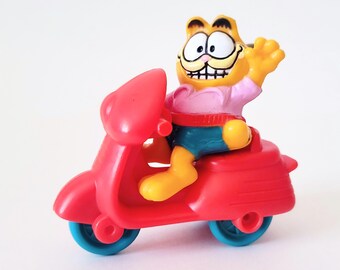 Vintage Garfield and Odie on Red Scooter Meal Toy 1989