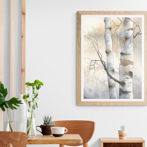 May include: A framed watercolour painting of two birch trees with white bark and branches against a light brown and grey background.