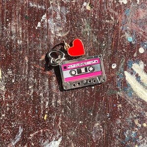 Conjunto de pingentes de músicas de amor em fita mista