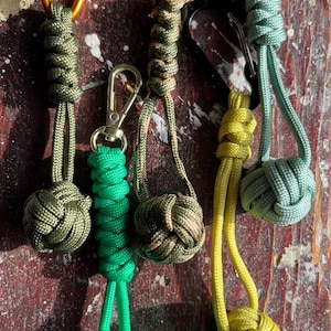 Monkey fist paracord knotted bag charm/paracord keychain/monkey fist knot/self defense/stones - Earth tones