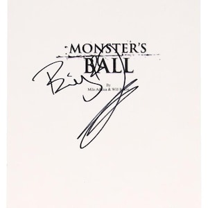 May include: White paper with the title "Monster's Ball" in a distressed font, with a signature in black ink. The text "By Milo Adica & Will Rokos" is below the title. A small, circular authentication sticker is in the bottom right corner.