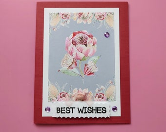 Generic greeting notecard with envelope, 'Best wishes' . Blank. Pink flower design.