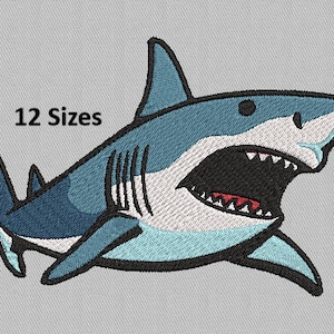 May include: Embroidered shark design in shades of blue, white, and black, with an open mouth revealing sharp teeth and a red interior. The text "12 Sizes" is above the shark. Suitable for various craft projects.
