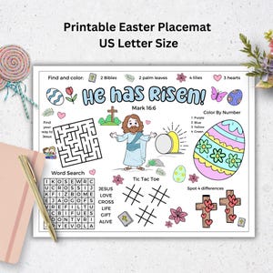 May include: Printable Easter placemat with activities for kids. It features a word search, color by number, tic-tac-toe, spot the difference, and a maze. The placemat has a religious theme with the words "He has Risen!" and "Mark 16:6".