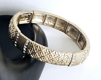VINTAGE Lia Sophia "Rue" Retired, Antique Goldtone Stretch Bracelet, Textured Panels,  Crystal Rhinestones,  Marked.