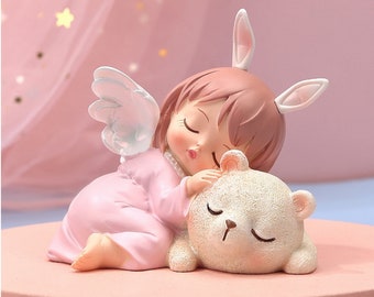 Childish fairy figurine with her cub