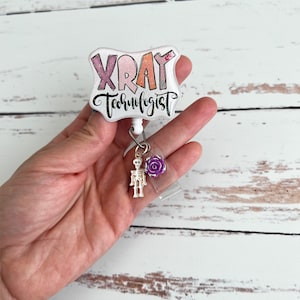 Adorable bobine de badges à rayons X