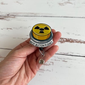 Best Button Pusher Badge Reel