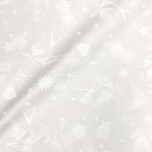 May include: A white fabric featuring a repeating pattern of light gray swallows, stars, sunbursts, and hearts. The design is printed in a subtle, monochromatic style across the smooth surface of the textile, creating a soft and delicate visual effect.