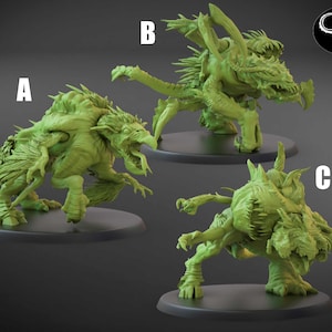May include: Three green plastic miniature figures of monstrous creatures with sharp teeth and claws. The figures are posed in a dynamic stance, ready for battle.