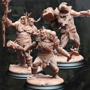 May include: Three detailed miniature figures of fantasy creatures, each with unique weapons and armor. The figures are painted in a light brown color and stand on separate bases.