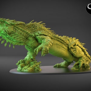 May include: A green, detailed, 3D printed model of a dinosaur, a Nova Raptor, with a large mouth and sharp teeth. The model is posed in a standing position with its head tilted back and its claws extended.