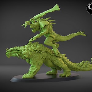 May include: A green miniature figurine of a lizard-like creature riding a larger, scaled lizard. The rider holds a sword in its right hand and has a spiky crest on its head.