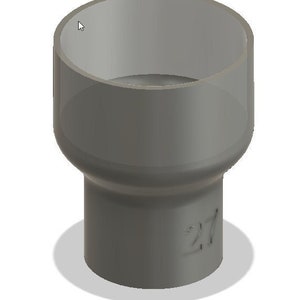 May include: A grey plastic pipe fitting, featuring a wide cylindrical top section and a narrower base. The number '27' is embossed on the side. This fitting is designed for joining pipes together.