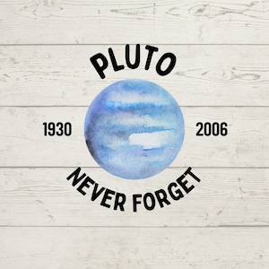 May include: A watercolor-style illustration of Pluto, a blue planet, with the text "PLUTO" above and "NEVER FORGET" below. The years "1930" and "2006" flank the planet. The design is set against a white wood-grain background.