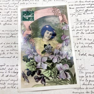 Anni '10 - Cartolina con una donna e dei fiori e la scritta "Bonne fête"