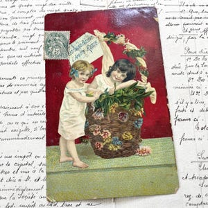 1900年代 - 子供たちと「花は過ぎ去り、友情は残る」という言葉が書かれたポストカード