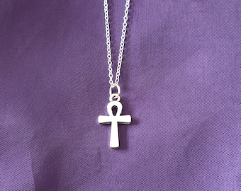 Adorable silver ankh necklace with agate stone addition.