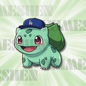 May include: A cartoon illustration of a Bulbasaur wearing a blue baseball cap with the LA logo. The Bulbasaur is light green with dark green spots, pink eyes, and a smiling expression. The background is light green with a repeating pattern.