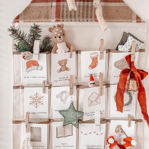 May include: A set of 32 printable Advent activity cards featuring illustrations of winter-themed activities, such as writing a letter to Santa, making paper snowflakes, and decorating a Christmas tree. The cards are displayed on a fabric advent calendar with a red and white checked pattern.