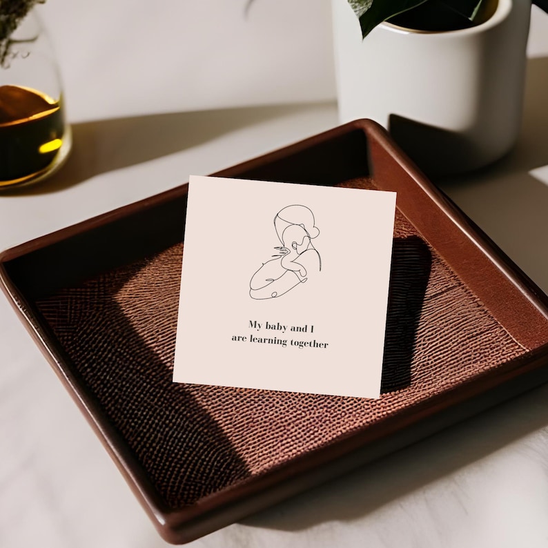 Affirmation deck for new moms. This quote reads: I am growing as a parent.