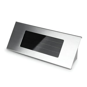 May include: A silver metal mailbox with a rectangular opening for mail. The mailbox has a slightly angled design.