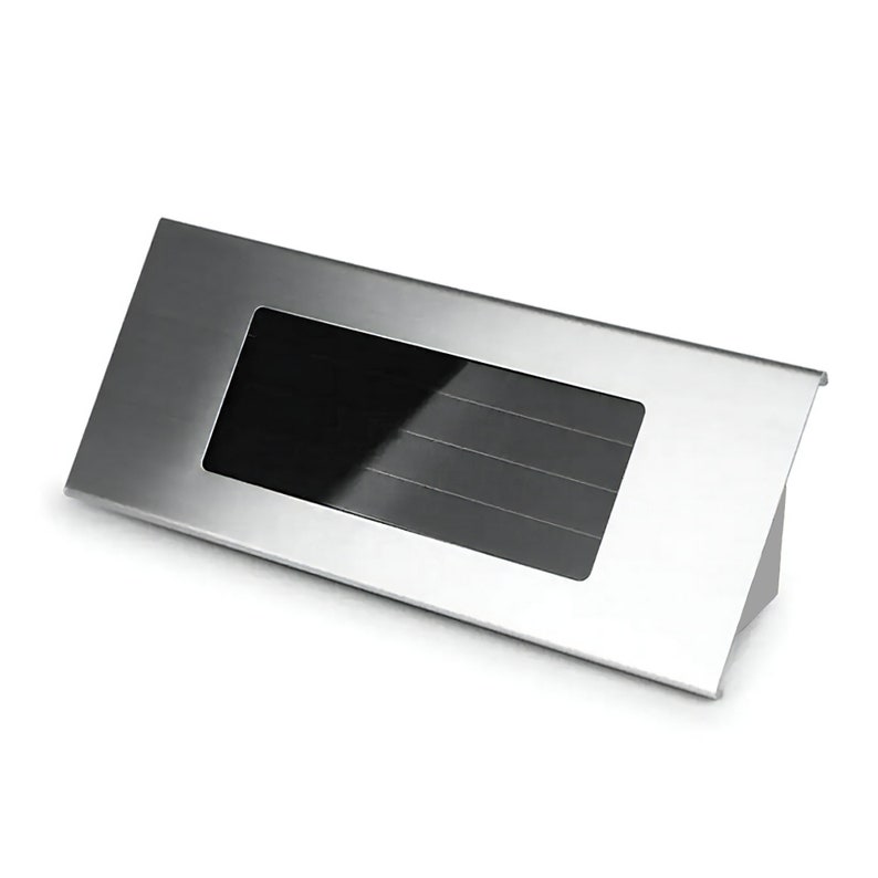 May include: A silver metal mailbox with a rectangular opening for mail. The mailbox has a slightly angled design.