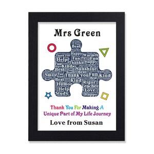 May include: A framed print with a blue puzzle piece design that says "Mrs. Green" at the top. The puzzle piece is filled with words like "best", "fun", "kind", "teacher", "help", "smile", "rigor", "love", and "happy". The print also says "Thank You For Making A Unique Part of My Life Journey Love from Susan".