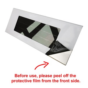 May include: A white rectangular metal sheet with a black protective film covering the front. The film has a corner peeled back to reveal the metal surface. Text on the image reads: "Before use, please peel off the protective film from the front side."