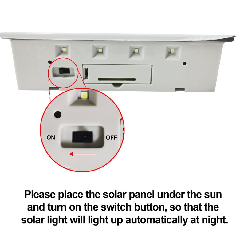 May include: Close-up of a white solar light with an on/off switch. The light has four LED bulbs and a solar panel. The text "ON" and "OFF" is printed on the switch.