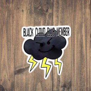 May include: Black and white sticker with a cartoon black cloud with a face and lightning bolts. The text "BLACK CLOUD CLUB MEMBER" is above the cloud.