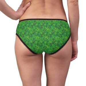 May include: Green and black underwear with a marijuana leaf pattern.