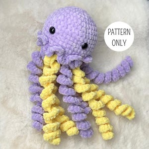 May include: A handmade, plush crochet octopus in shades of lavender and yellow. The octopus has a round head with black safety eyes and curly tentacles. The text "PATTERN ONLY" is in a white circle.