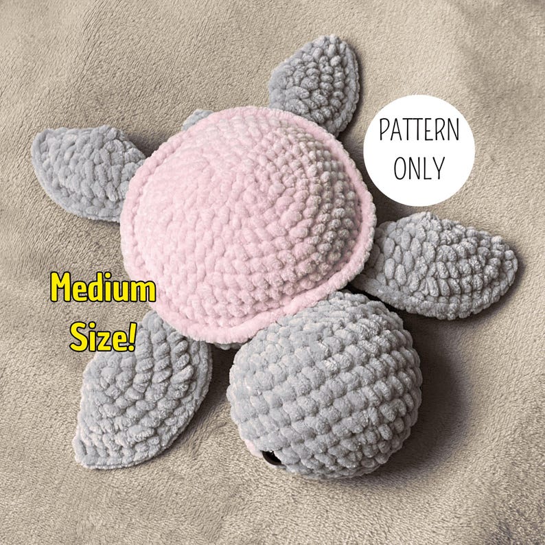 A turtle crochet plushie made with soft yarn, made with colours pink and grey. This is a medium sized turtle. This listing is a crochet pattern PDF tutorial.